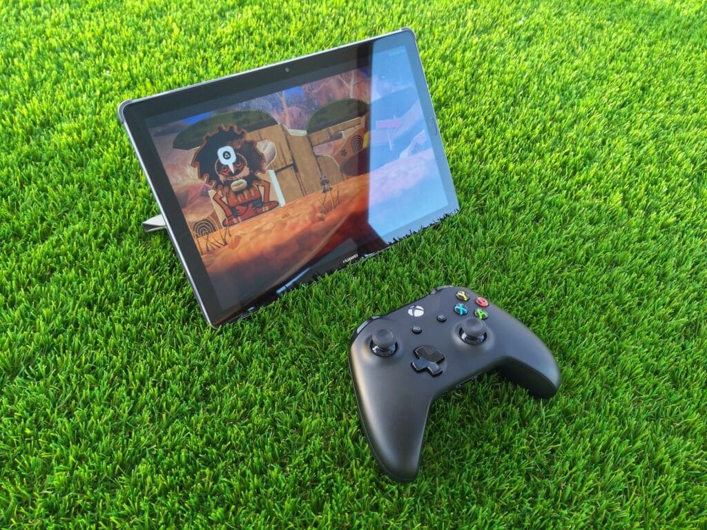 A tablet and an Xbox gaming controller.